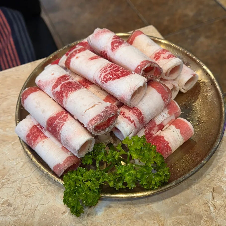 Beef belly rolled into a whirlwind shape