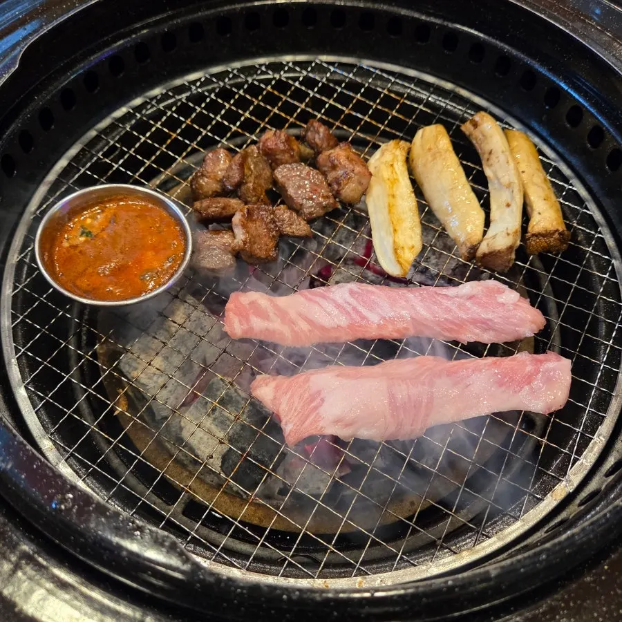 Pork neck and pork jowl grilled together