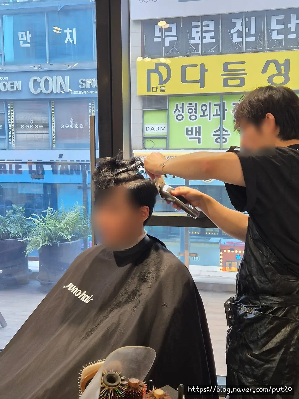 Scalp massager in front of the salon mirror