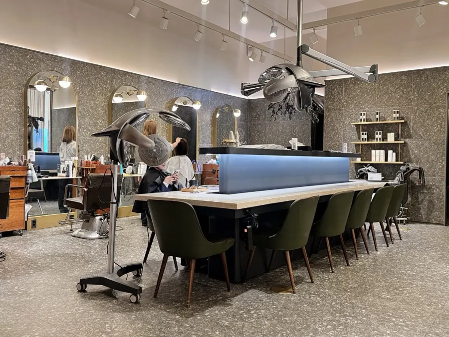 Clean and organized interior of the JUNO HAIR salon