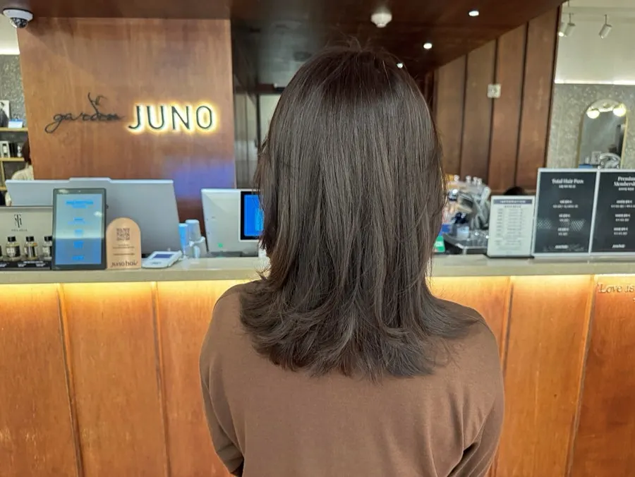 Hair brightened with ash brown color