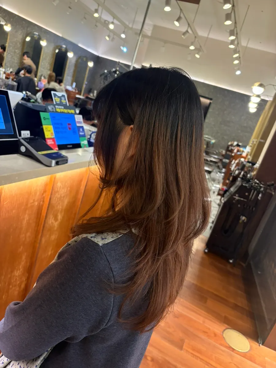 Final styling touches after blow-drying