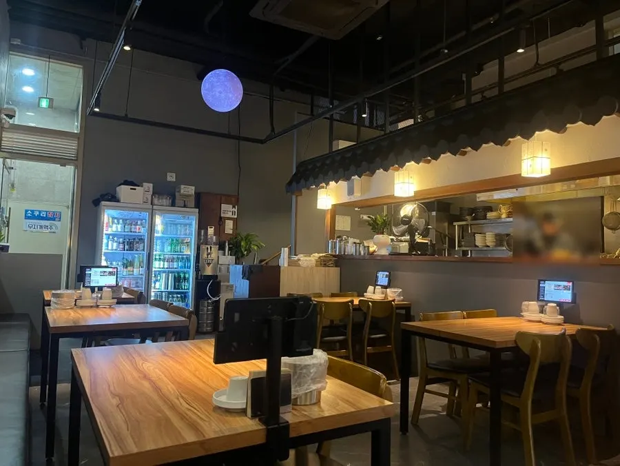 Seat on Jusangnakwon's 1st floor overlooking the open kitchen