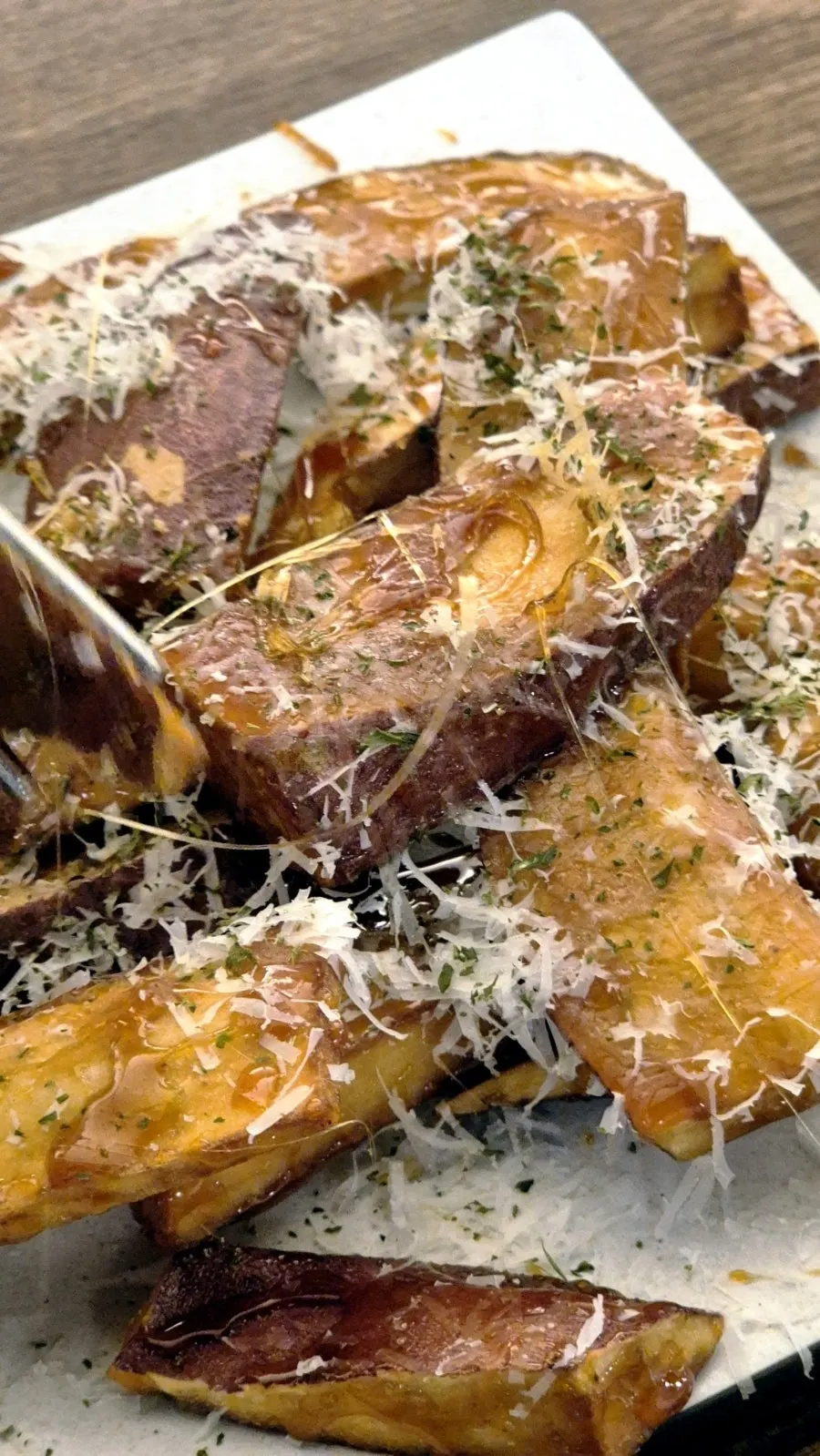 Cross-section of sweet potato ppasu with parsley topping