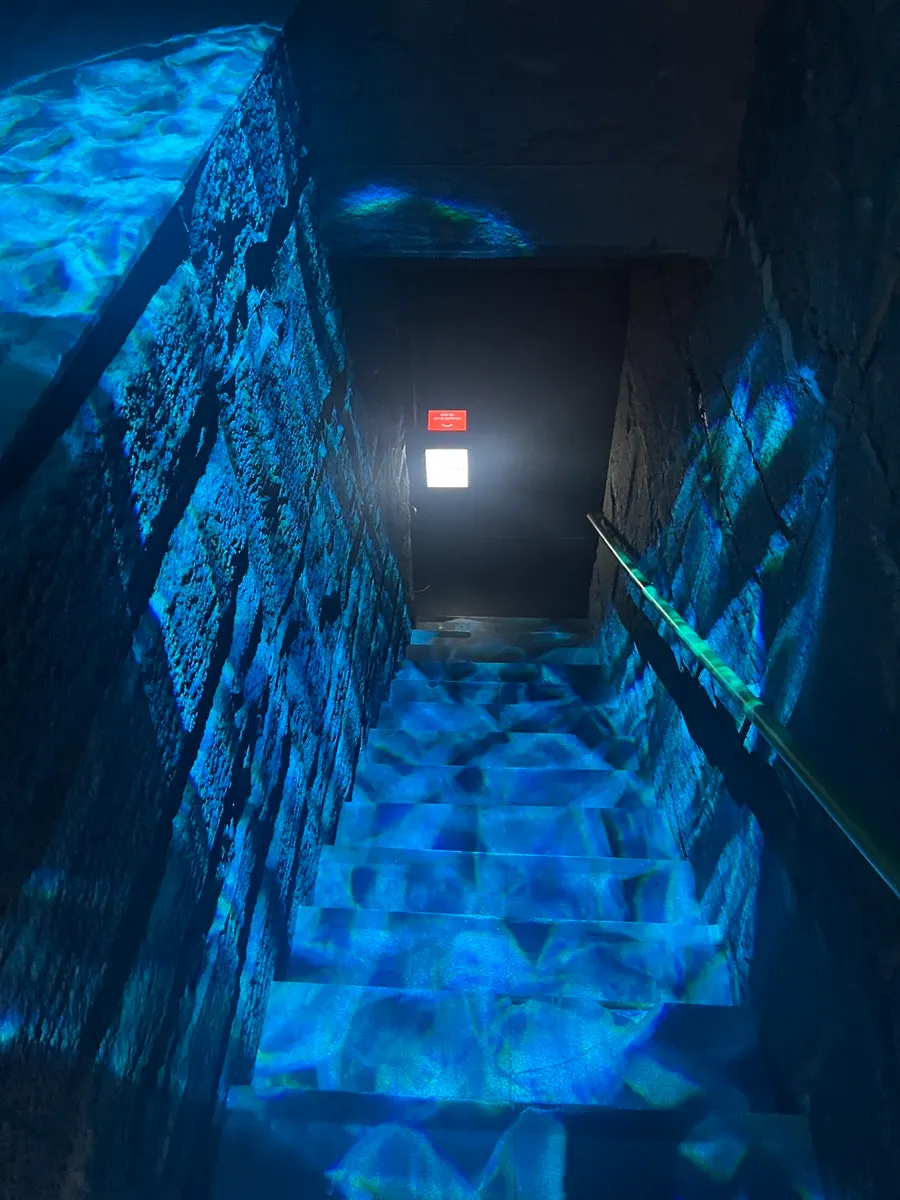Stairs leading down to the basement entrance of Jusindang Gangnam