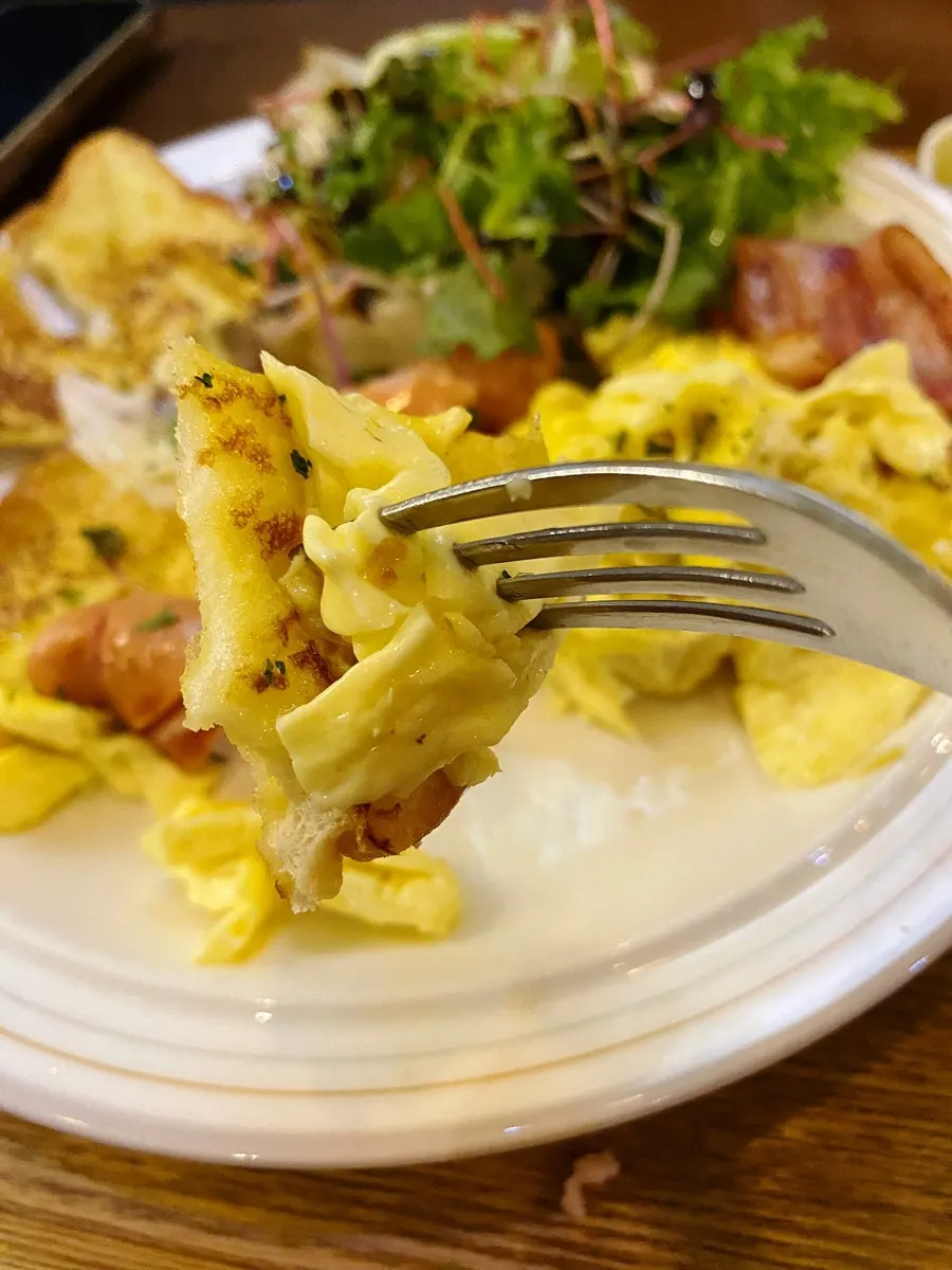 Brunch plate topped with ricotta cheese salad