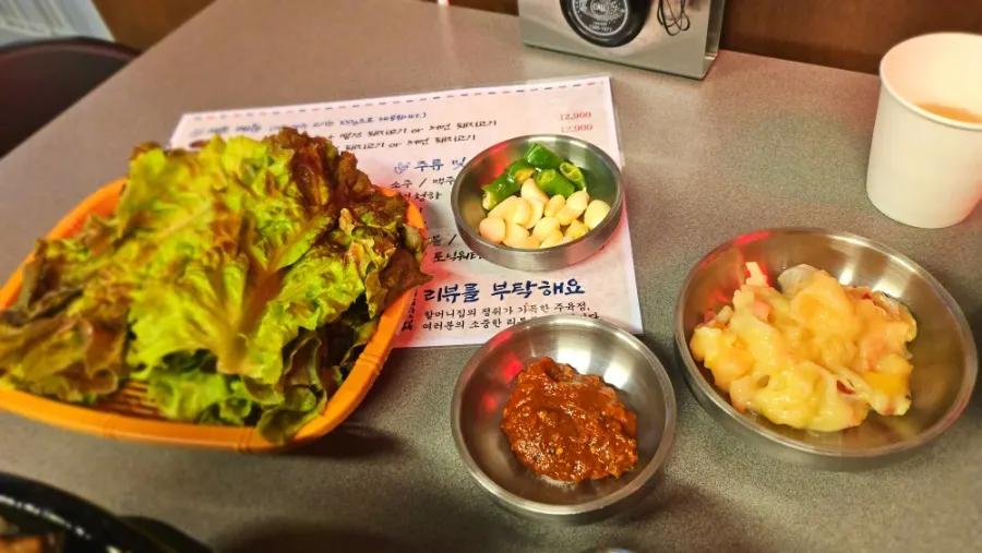 Self-serve corner with potato salad and lettuce