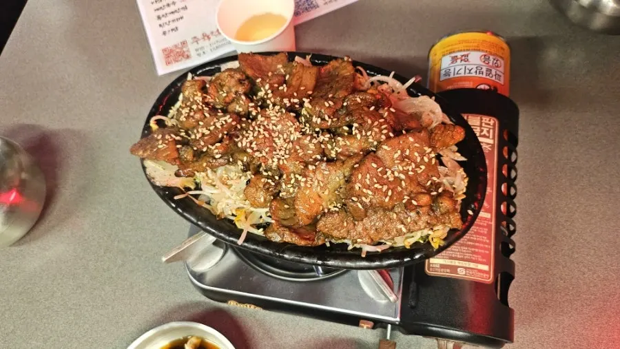 Juyukjeom lunch menu board with kimchi-roll noodles