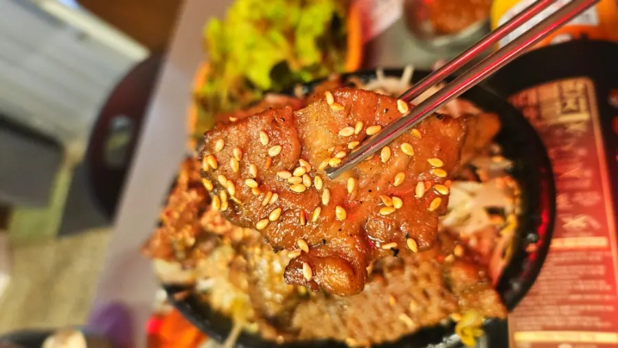 A full spread of Juyukjeom's signature black pork