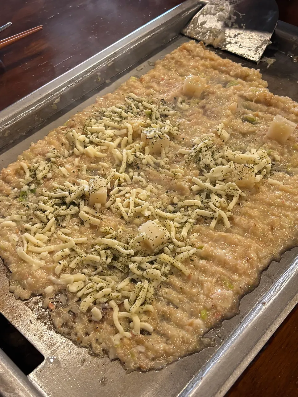 Mentaiko monjayaki topped with mozzarella cheese