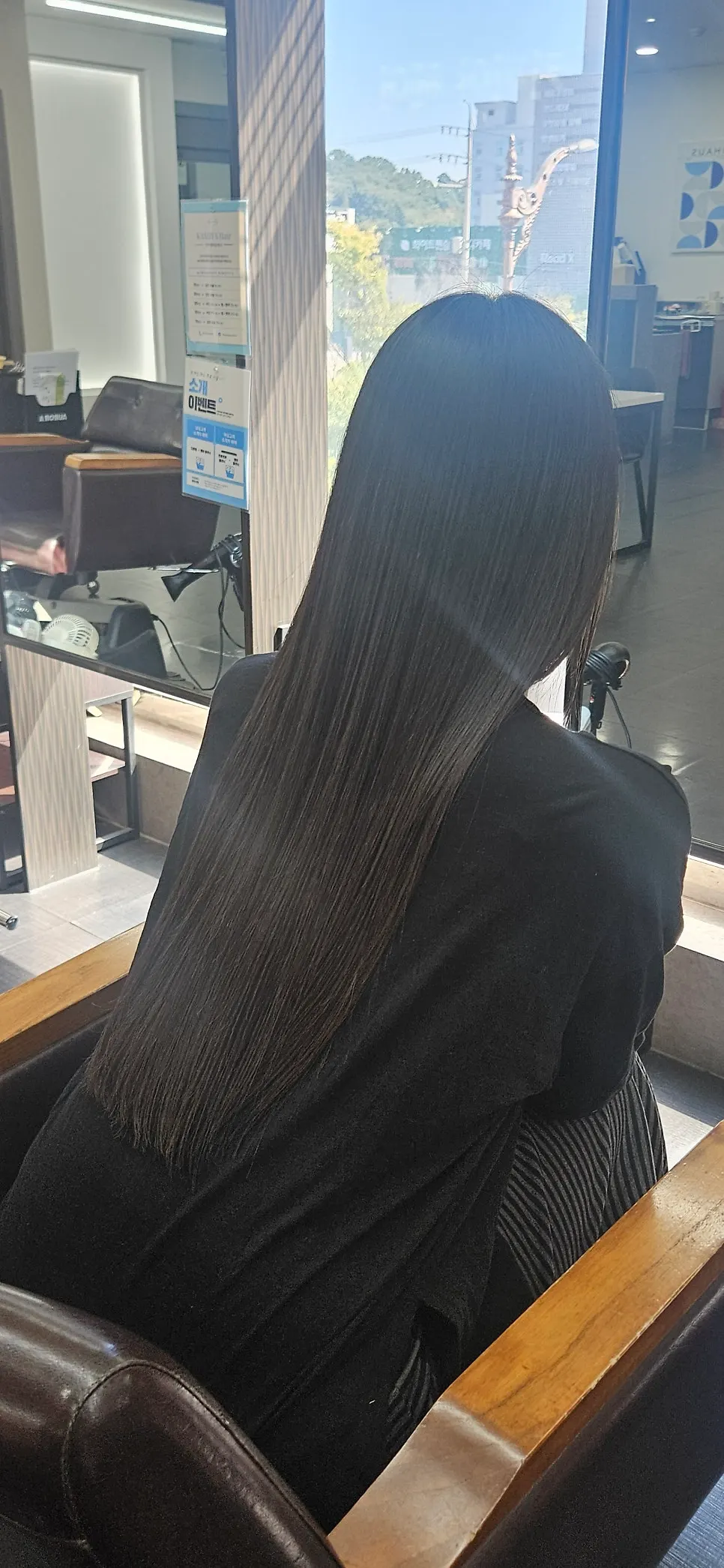 Long hair straightened right after the treatment