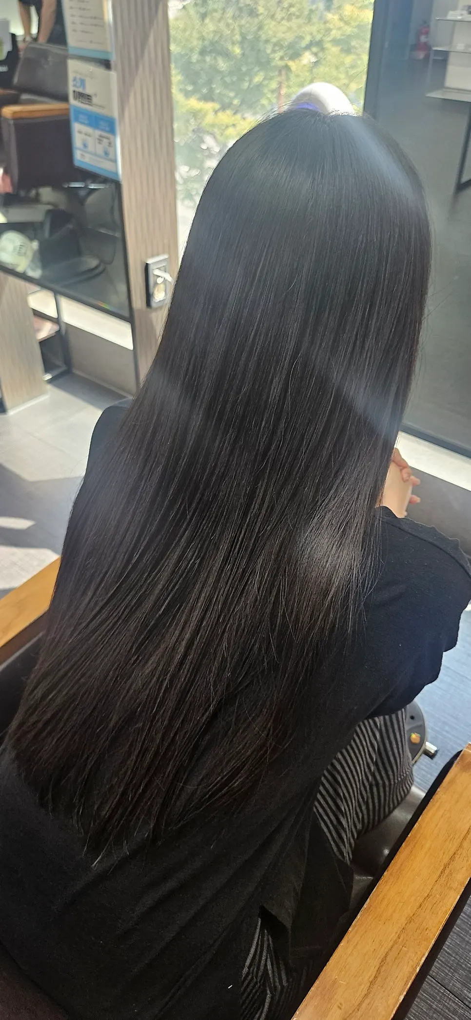 Full back view after finishing the straightening treatment