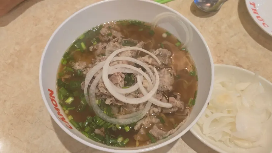 Full spread of Kkamon pho and side dishes