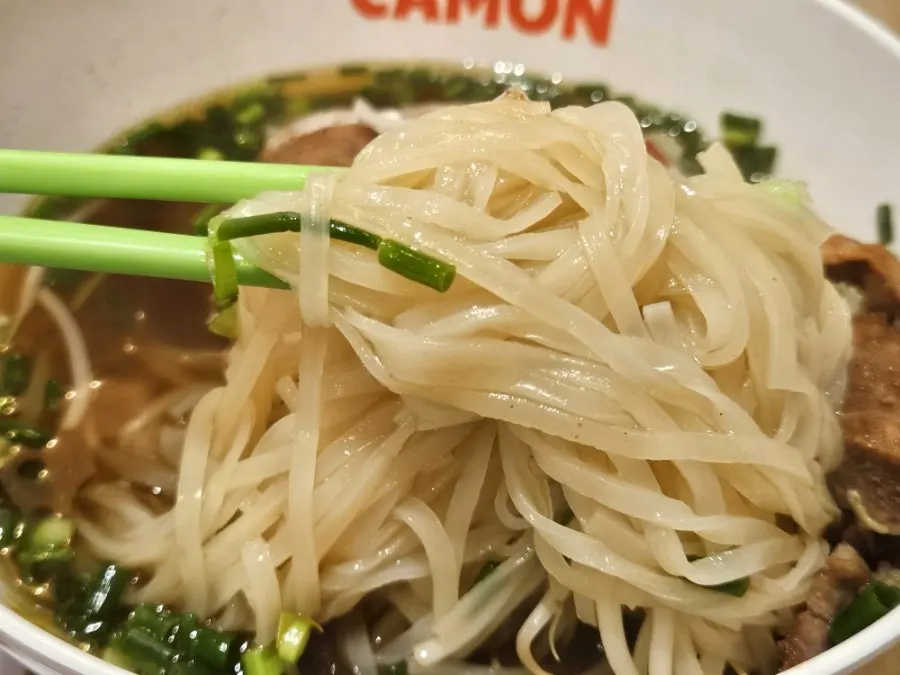 Onions and sauce served alongside the pho