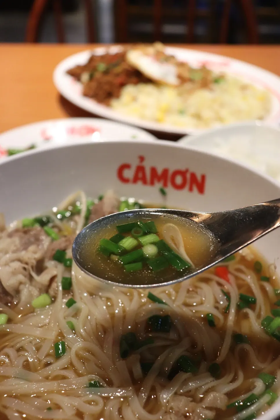 Tangy pickled onions served alongside the pho