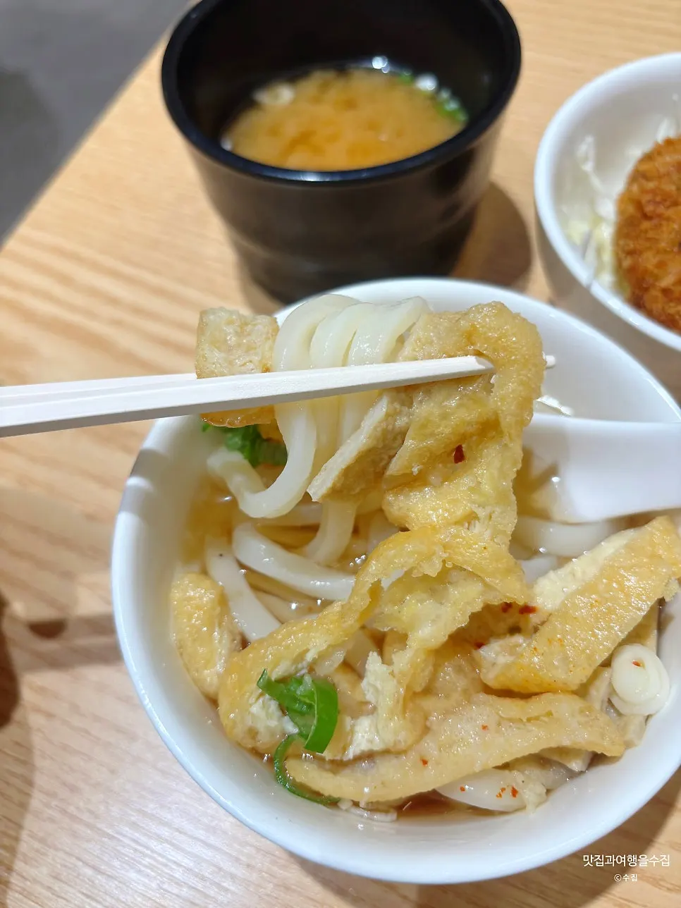 Seafood croquette served over shredded cabbage