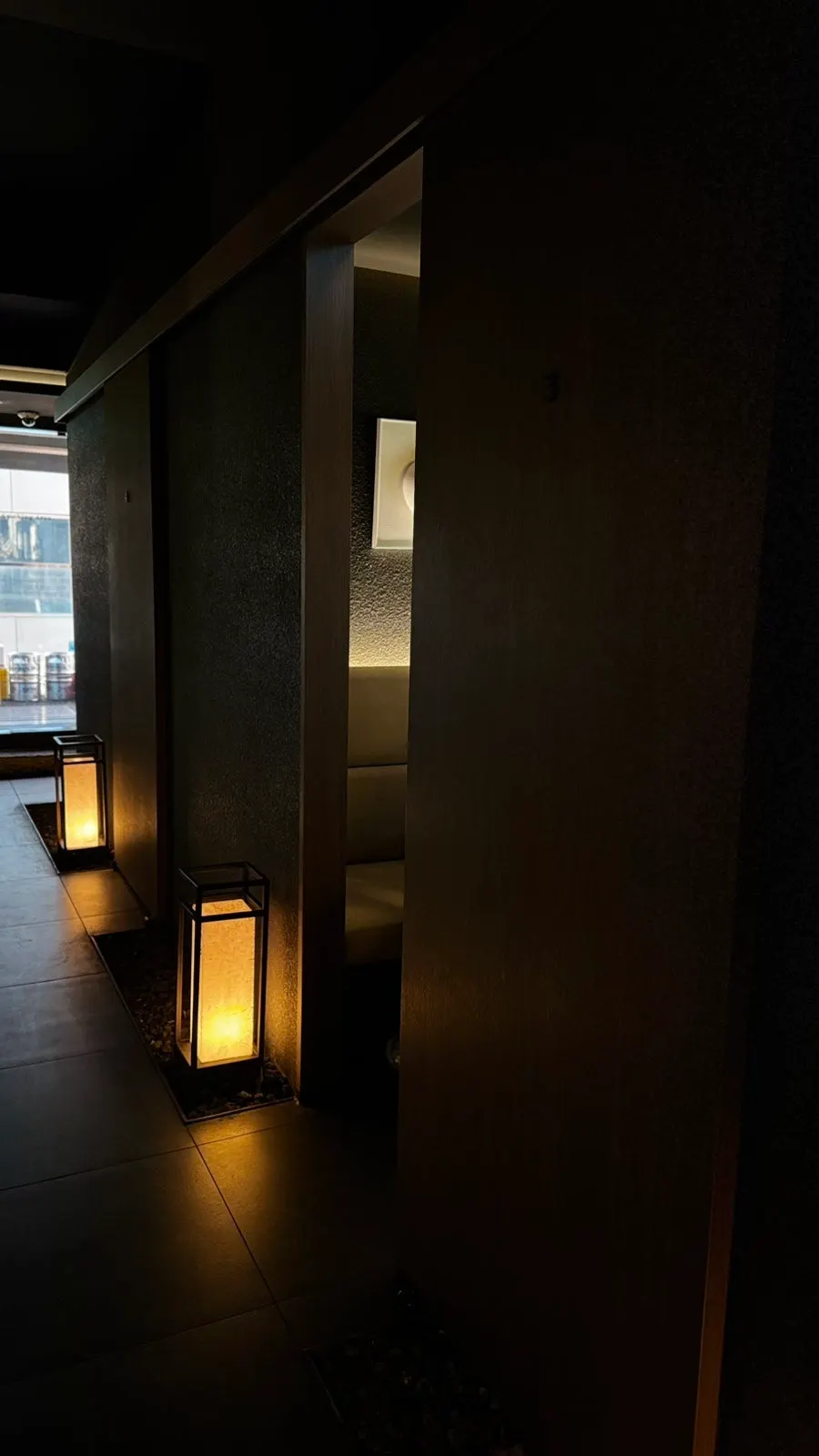 Glass block wall and soft pendant lighting
