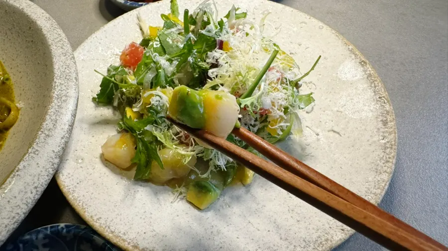 Ceviche with abalone and scallop over green sauce