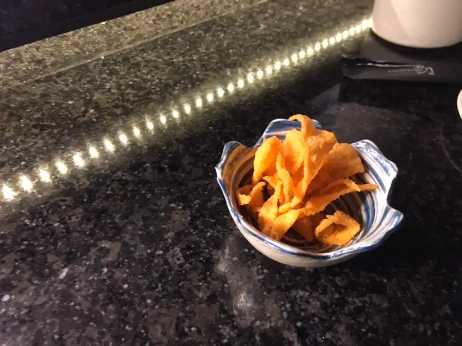 Cheese-seasoned nachos served as a basic side dish