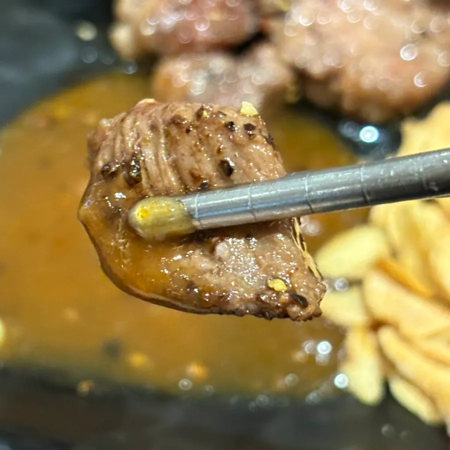 Flank steak served with sauce and wasabi