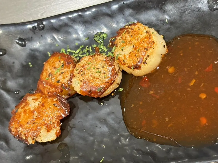 Short rib steak paired with sautéed bean sprouts