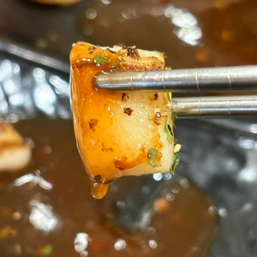 Cuttlefish stir-fry in the same sauce as the scallops