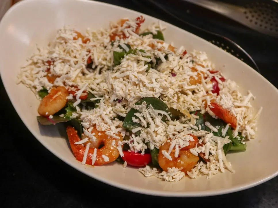 Kari's shrimp paneer salad topped with paneer cheese