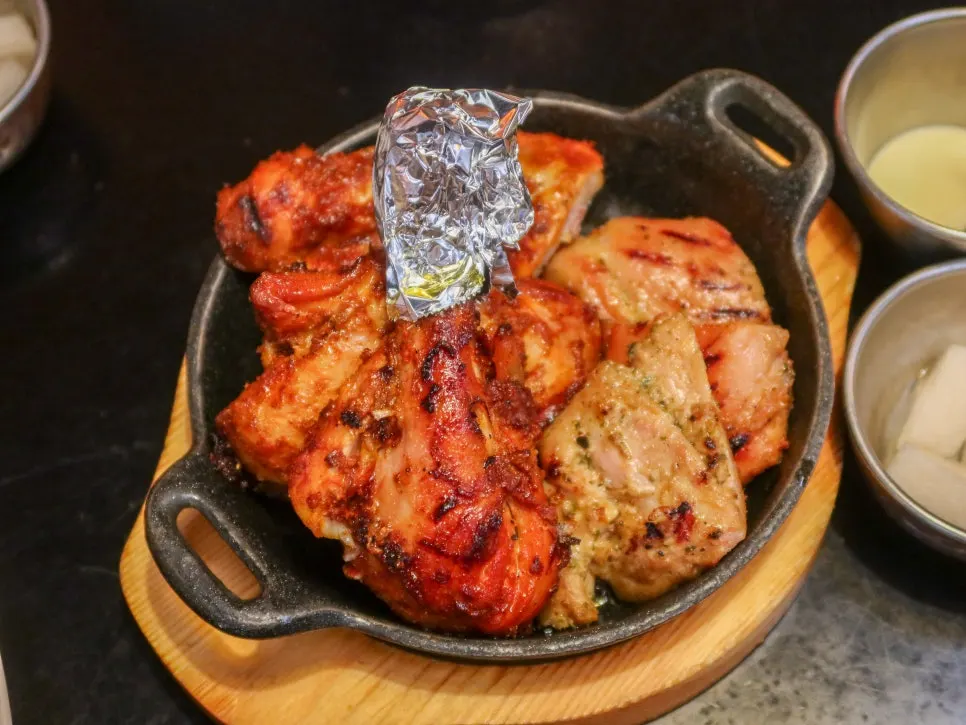 Close-up of tandoori chicken with different cuts