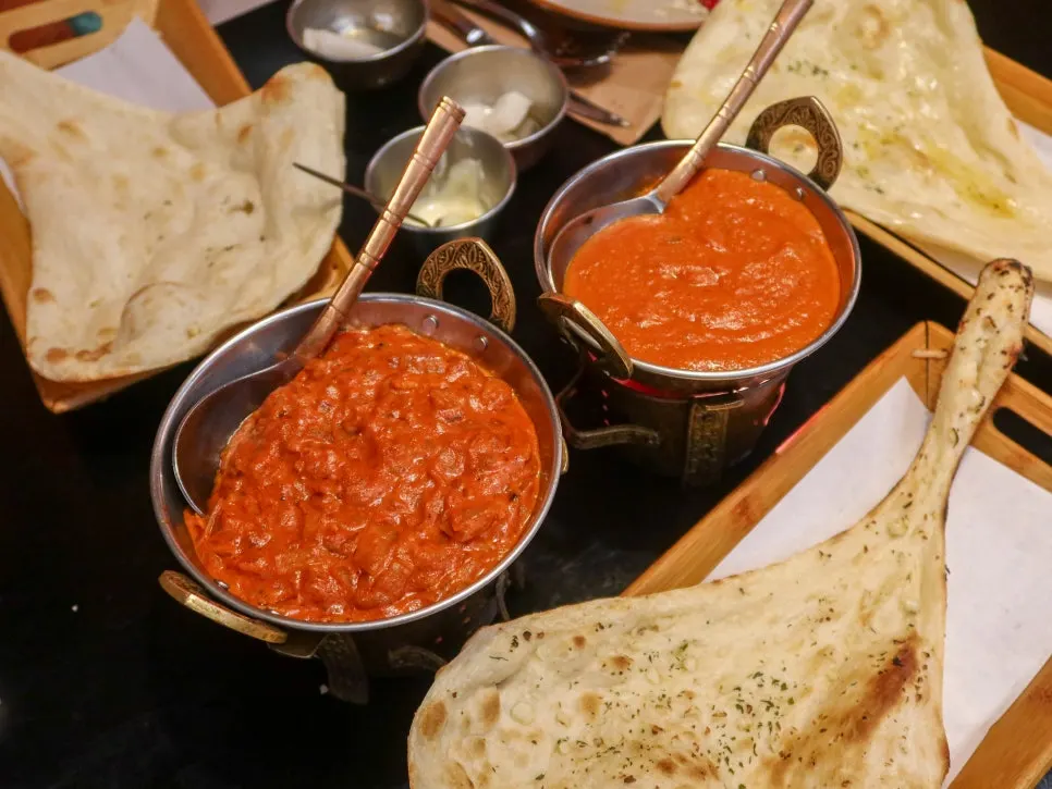 Large plain naan, butter naan, and garlic naan