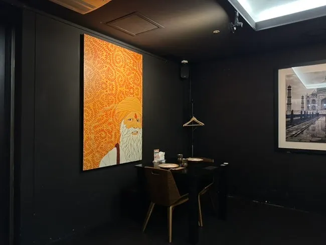 Kari interior decorated with photo frames from India