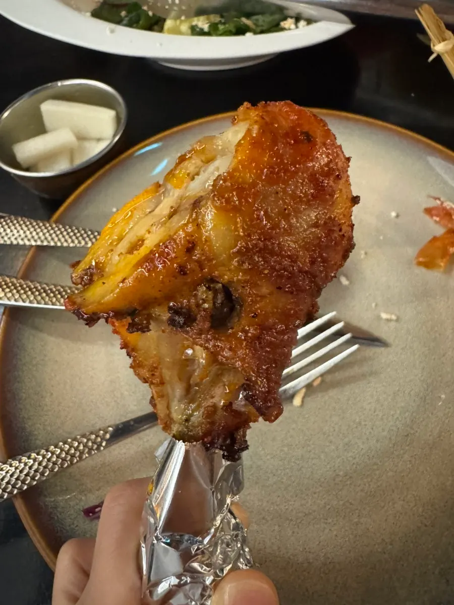 Herb salt chicken served with mango sauce