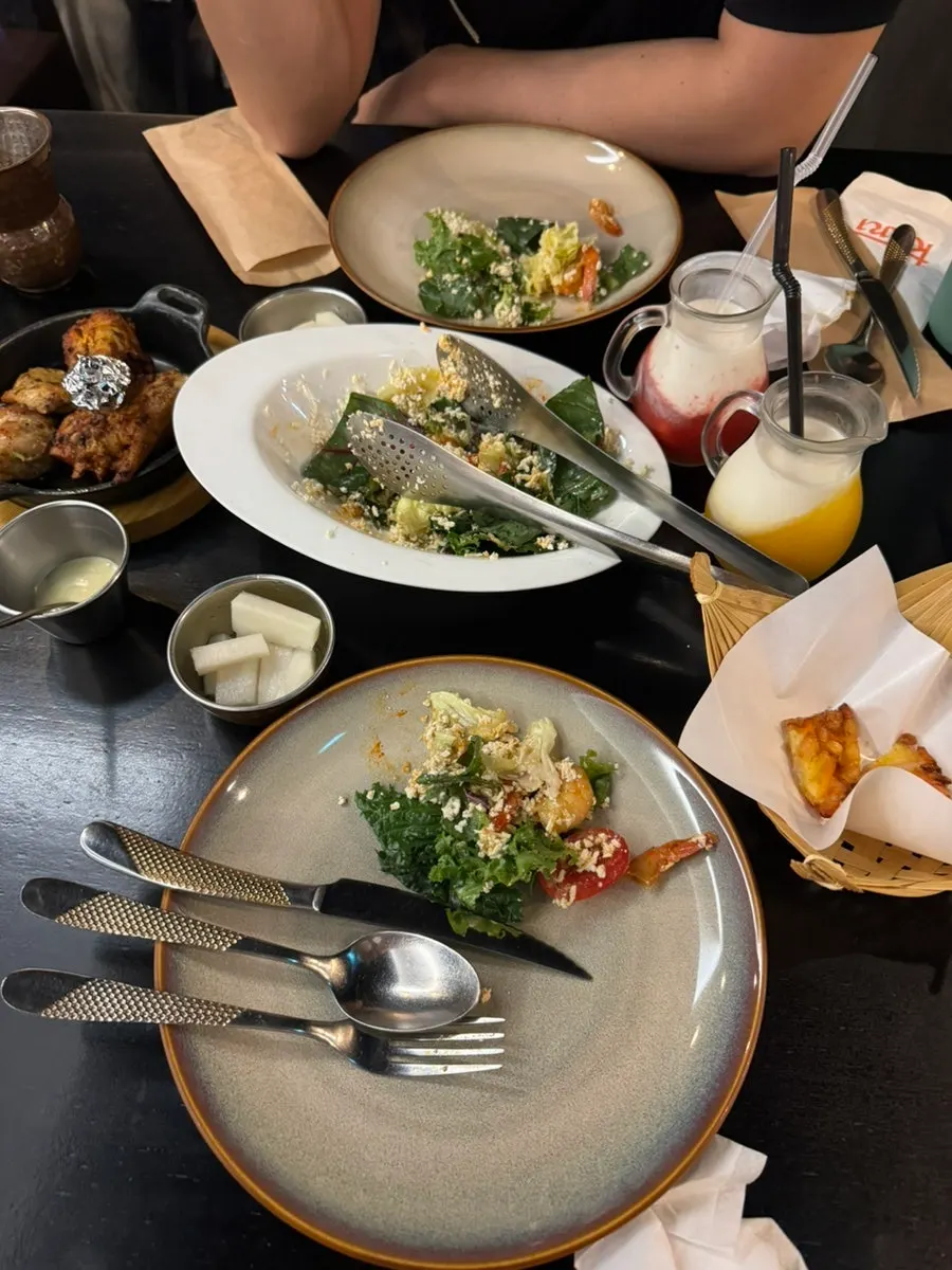 Table filled with dishes from the Kari couple set