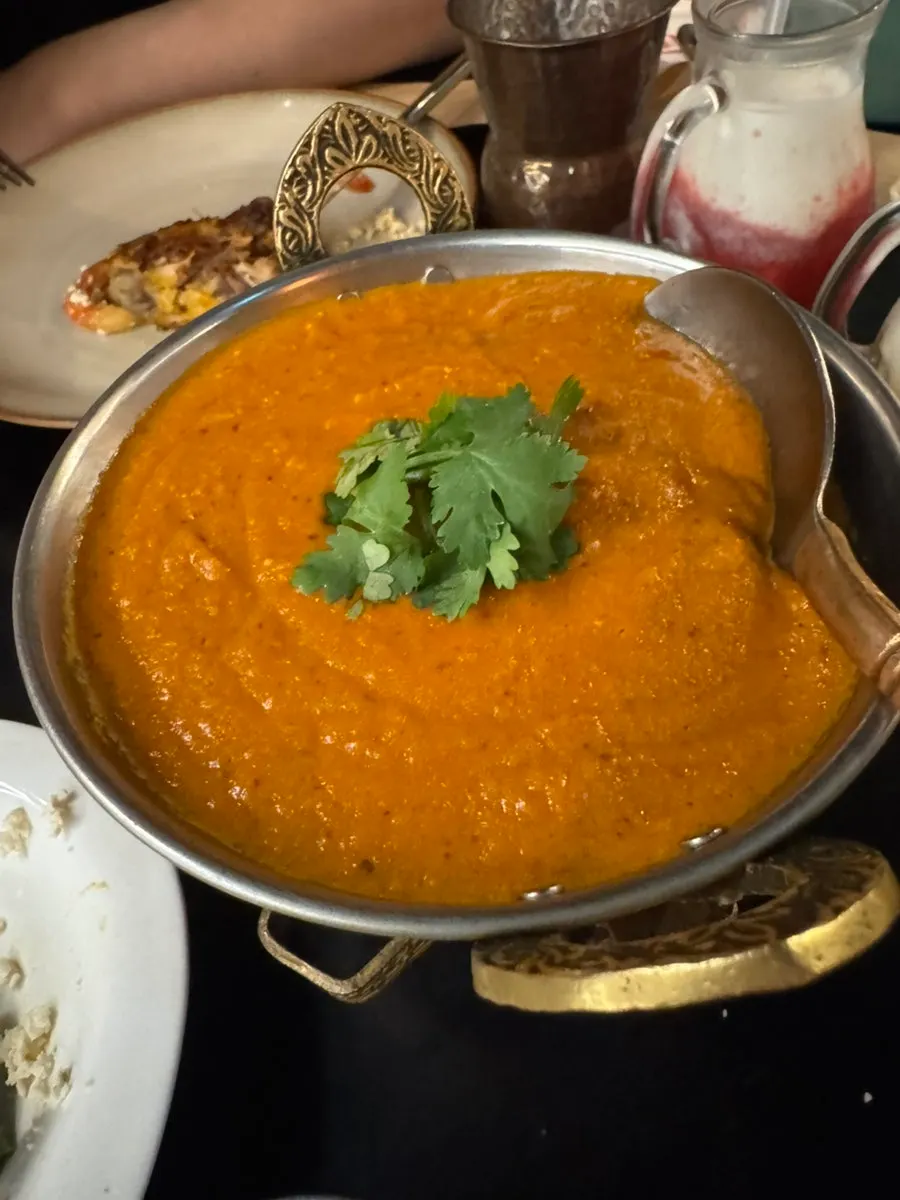 Large butter naan and garlic naan with butter chicken curry