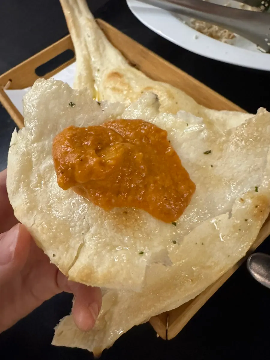 Butter chicken curry generously filled with chicken