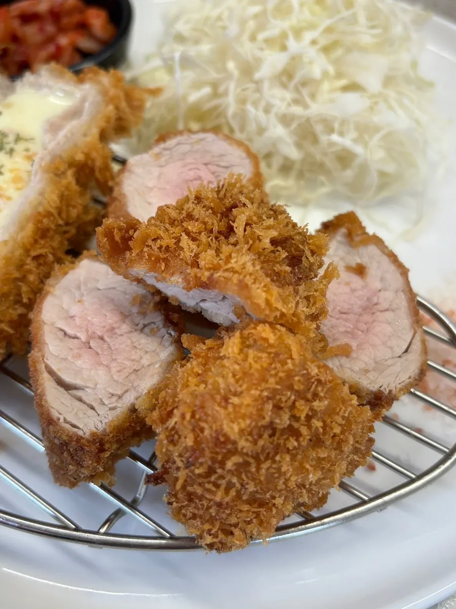 Cross-section of a thickly cut tenderloin tonkatsu