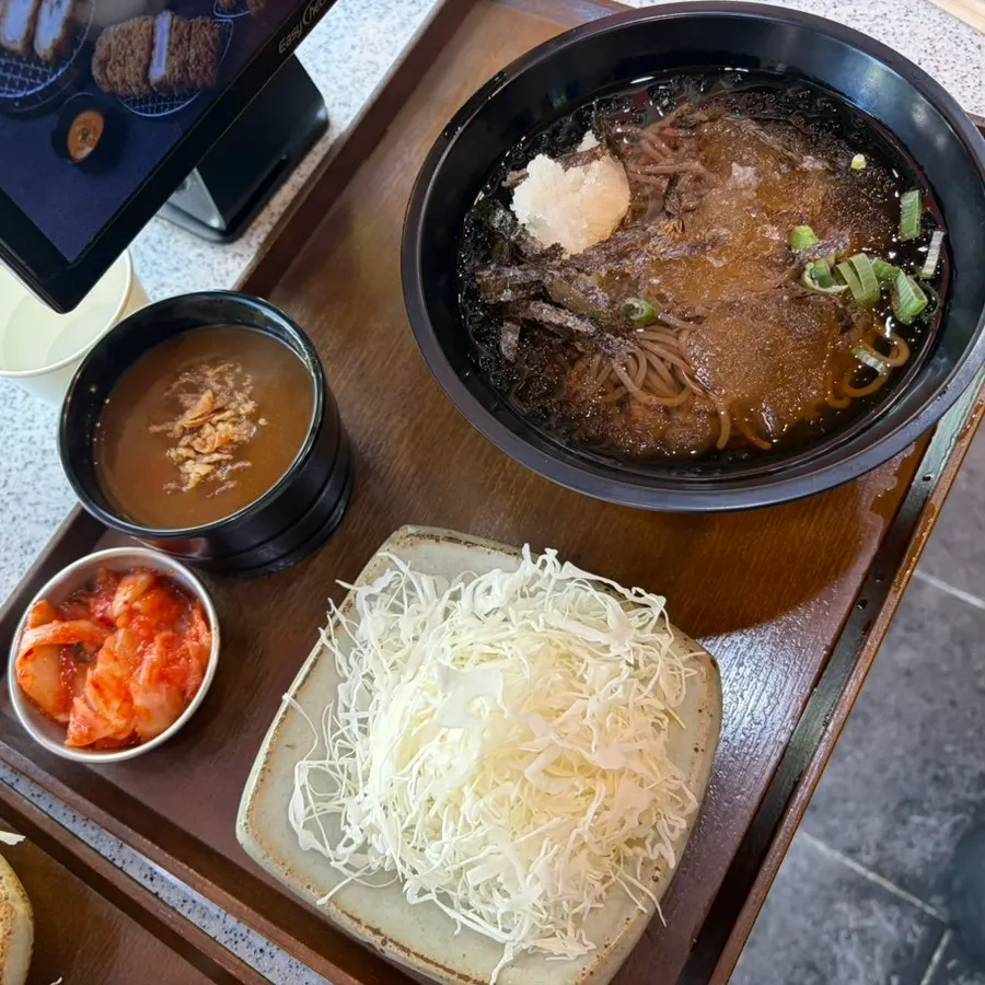 A piece of tonkatsu dipped in curry