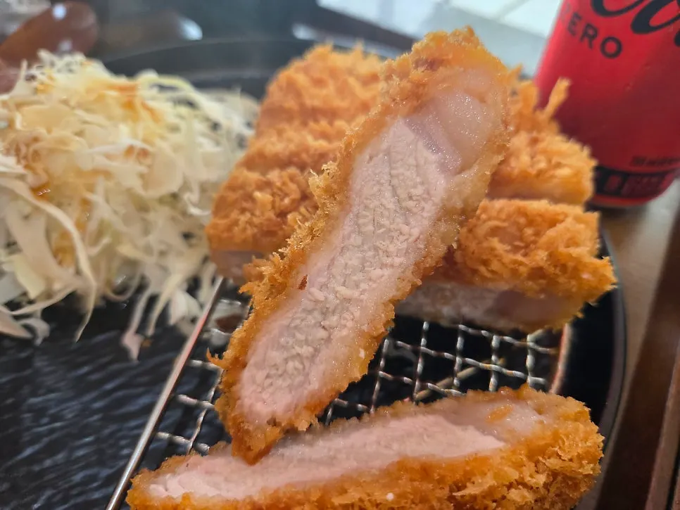Cross-section of the pork loin katsu showing its juices