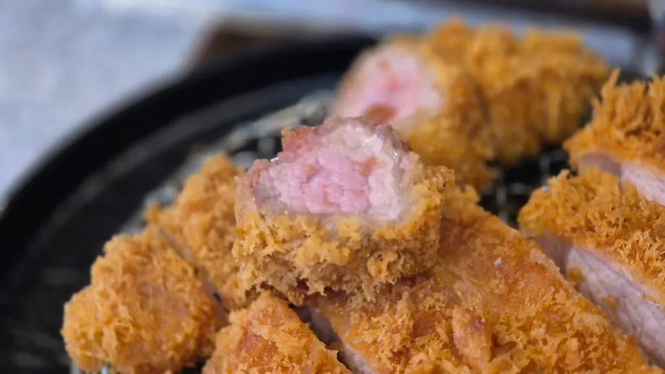 Close-up of a sliced tonkatsu cross-section