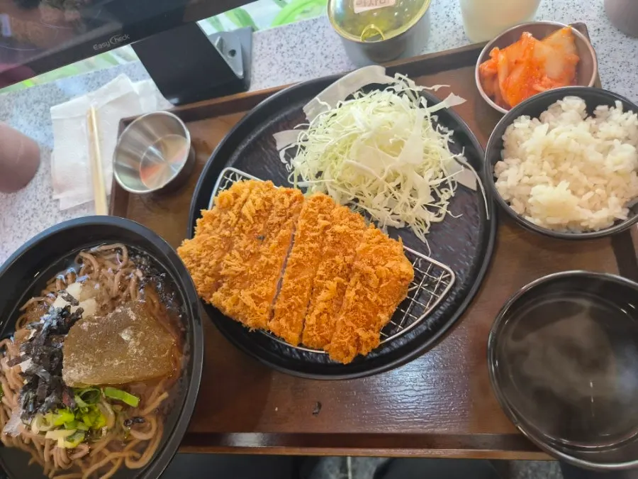 Cross-section of cheese katsu with stretchy melted cheese