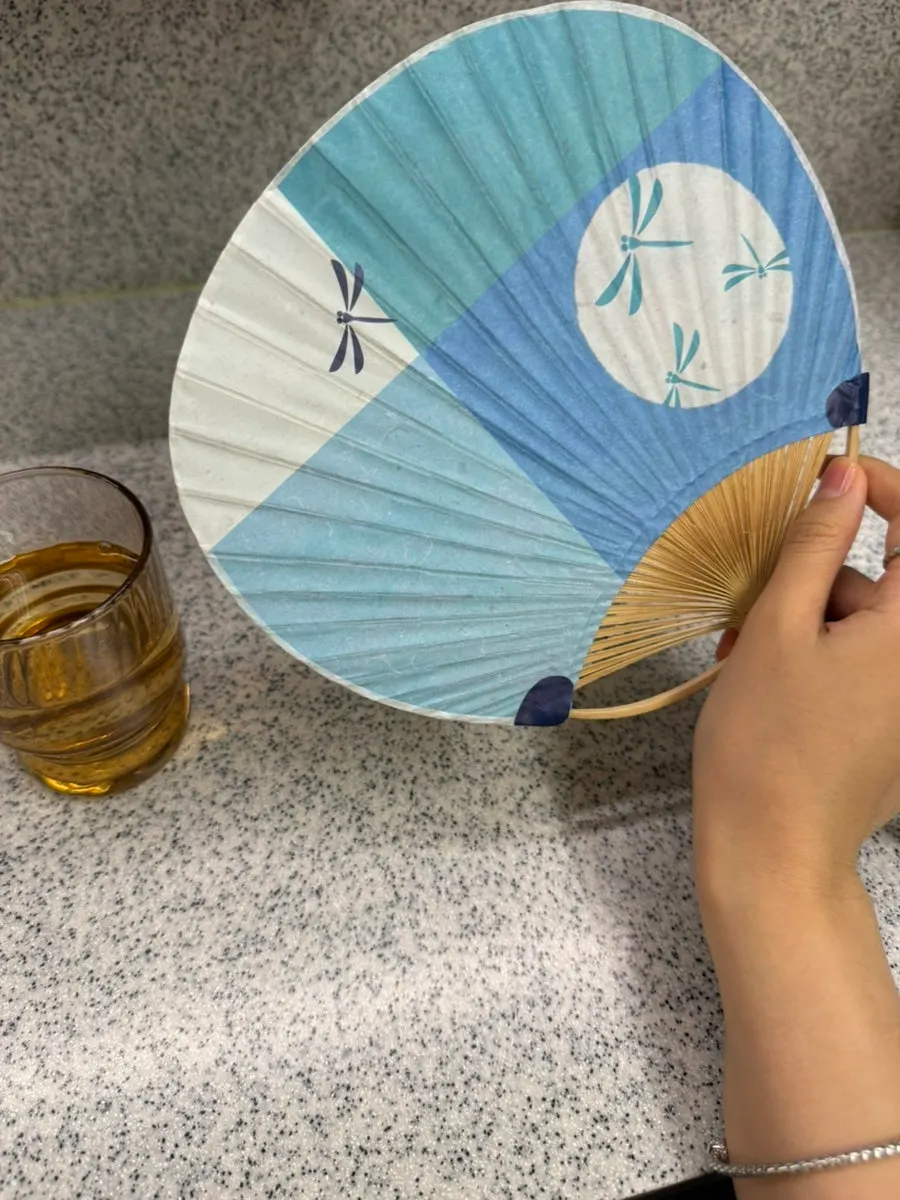A cute fan set on the table