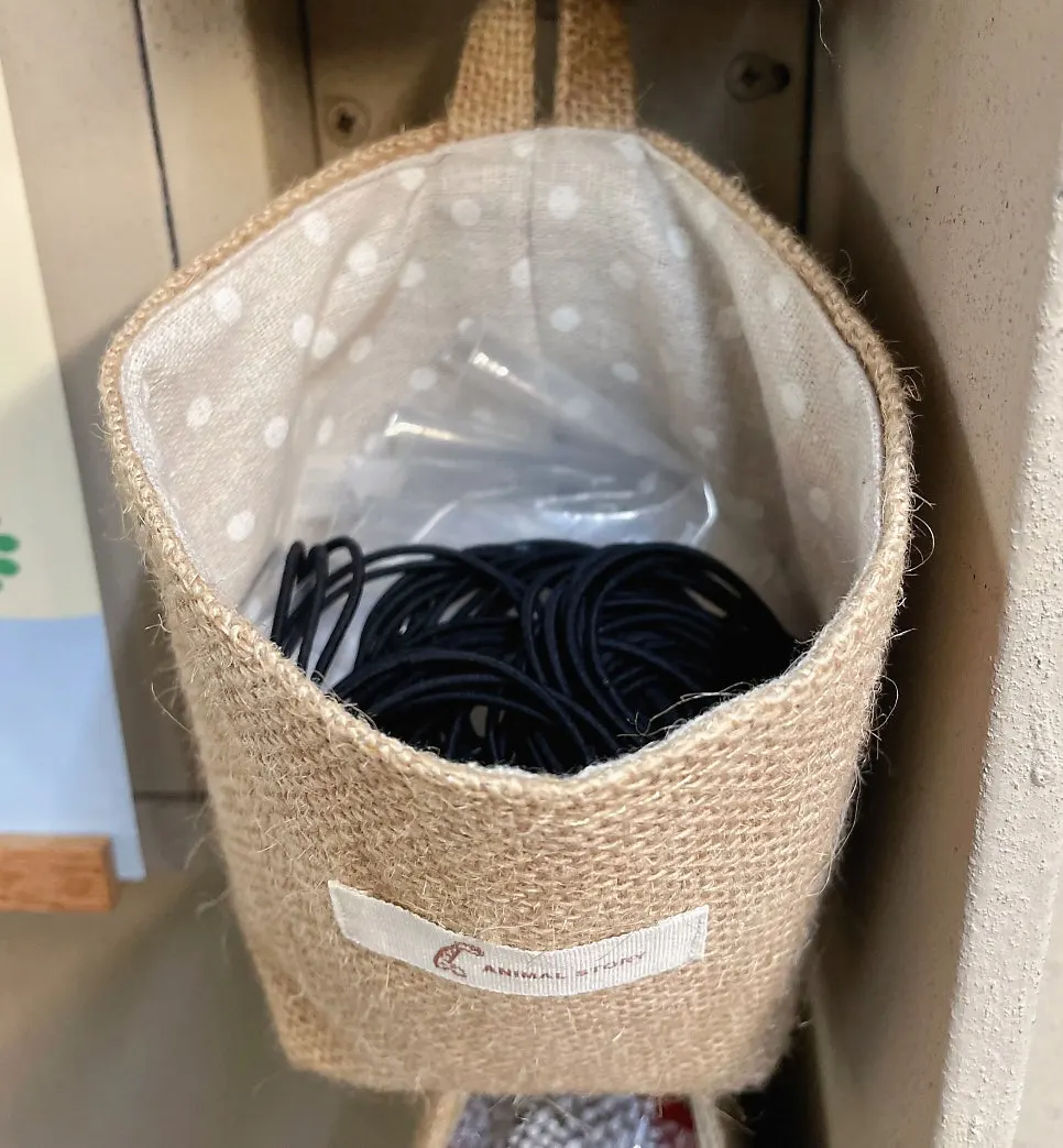 Basket of hair ties for customers