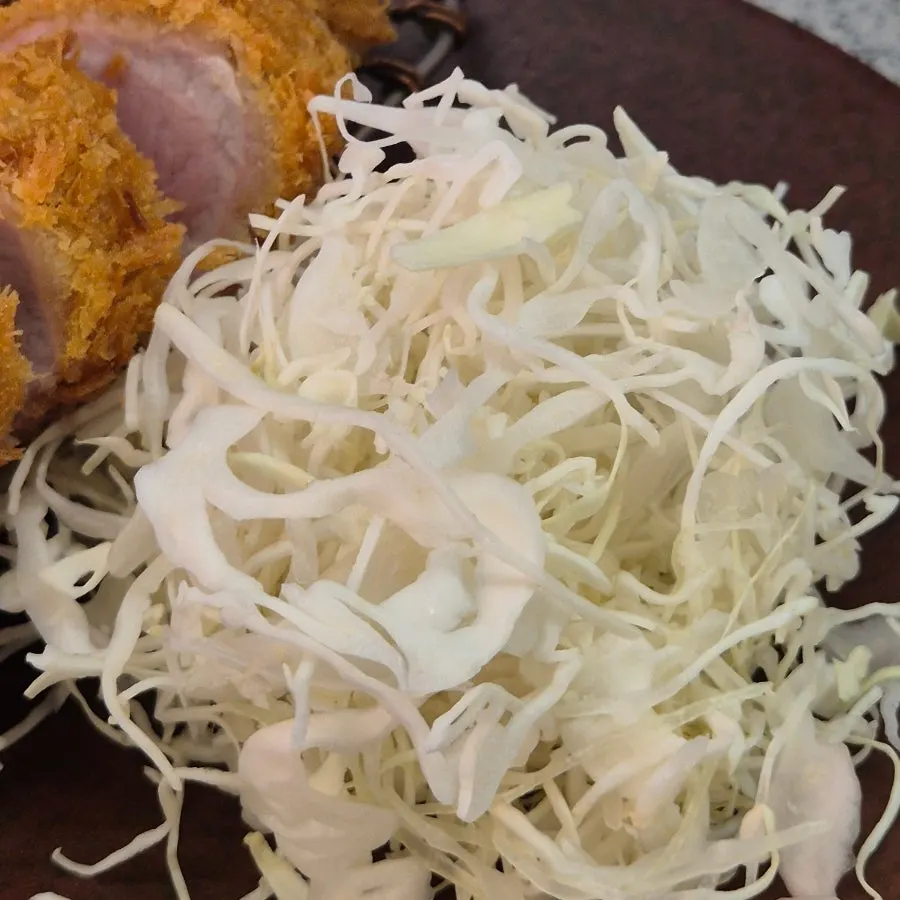 Cross-section of juicy fillet pork cutlet, hirekatsu