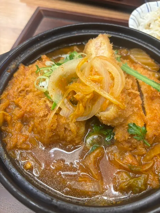 Bubbling stone pot of kimchi katsu nabe