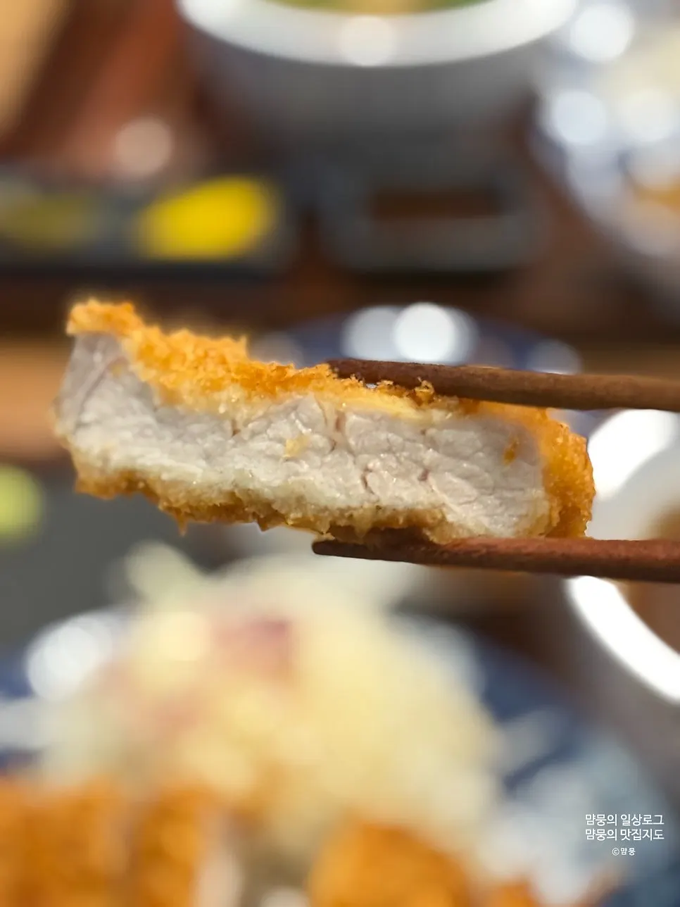 Cross-section of rosu katsu showing white meat inside