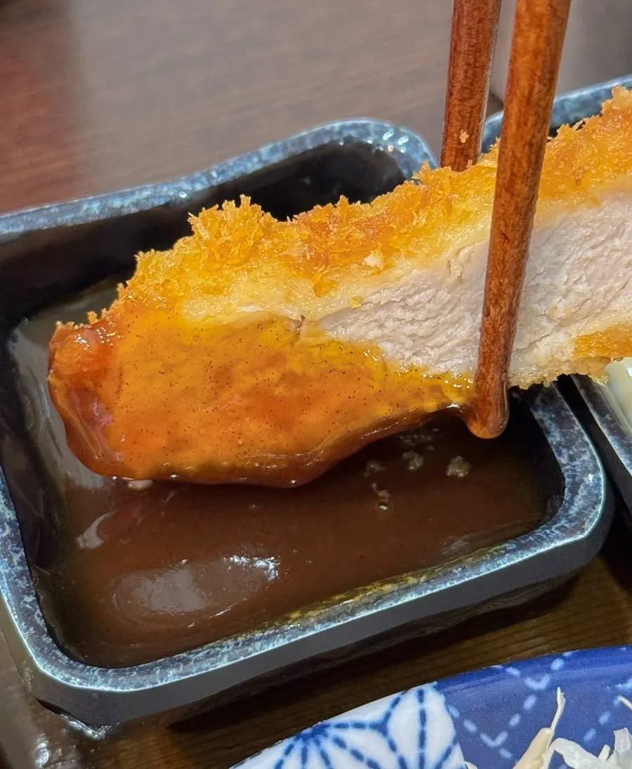 Cross-section of tonkatsu with crispy batter