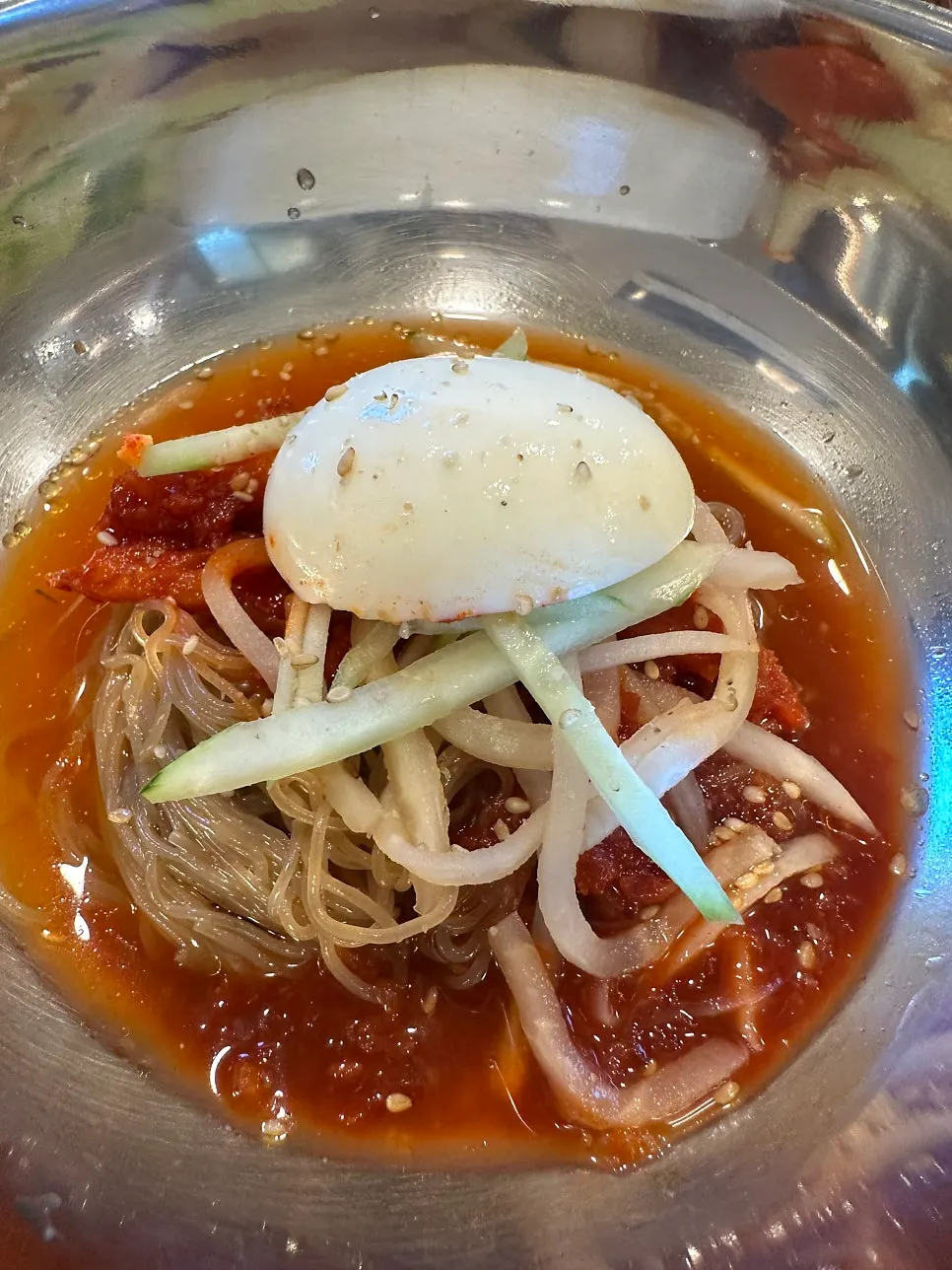 Pollock hoe bibim naengmyeon served for dessert