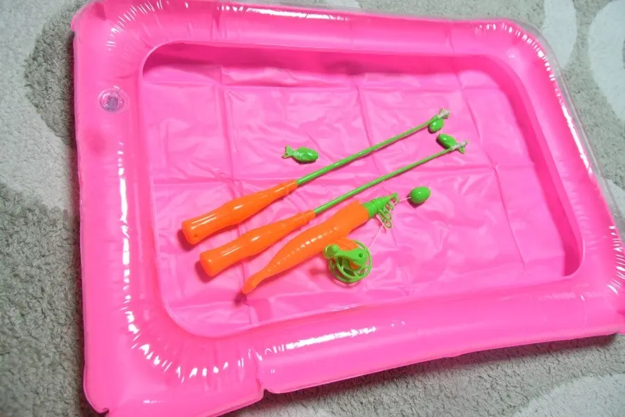 Preparing the air pad for a children’s fishing game