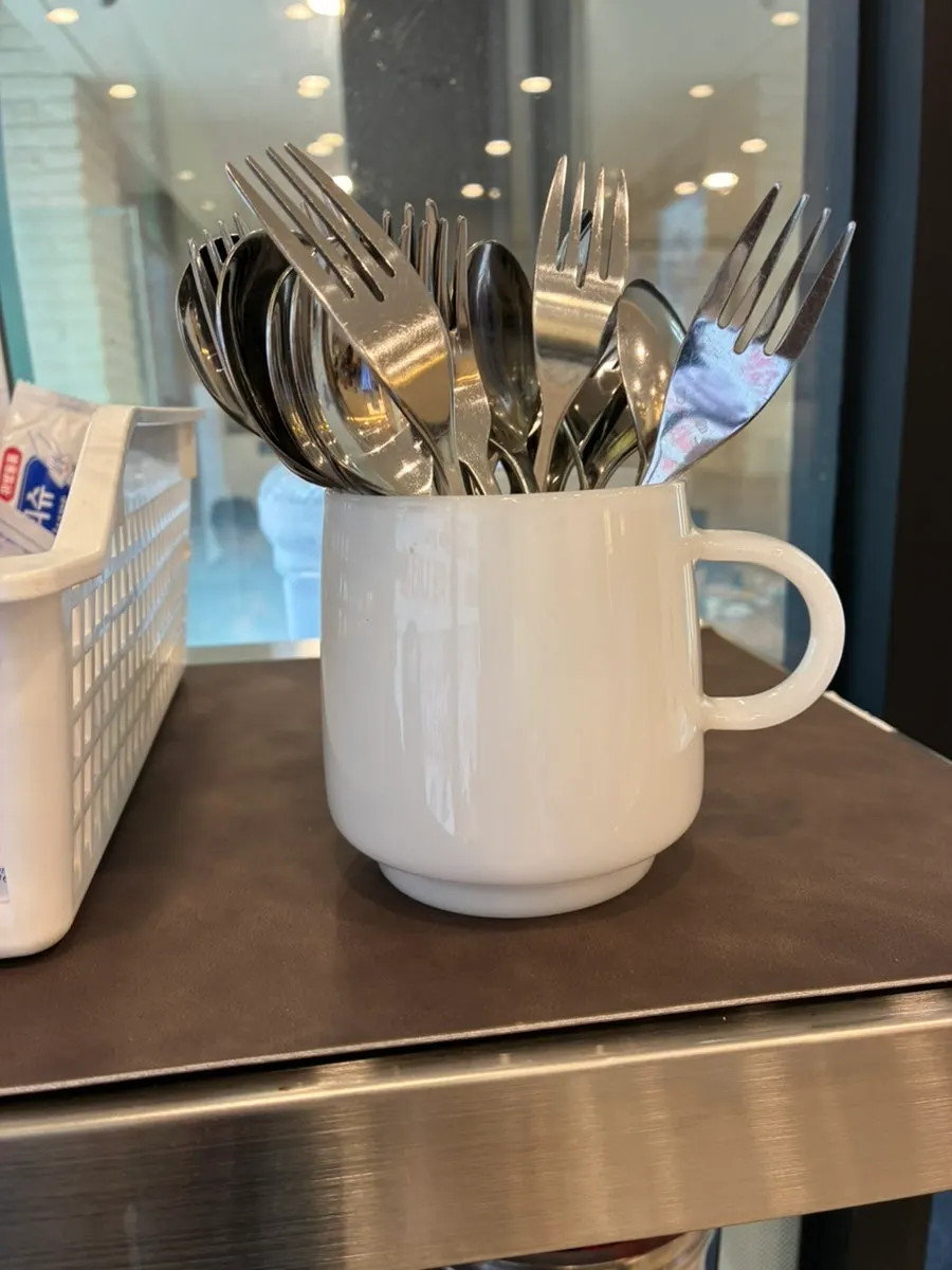Self-serve corner set up on one side of the restaurant