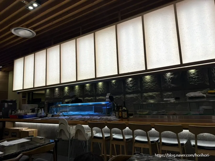 Spacious tables in the dining hall of Moshi Moshi Sushi
