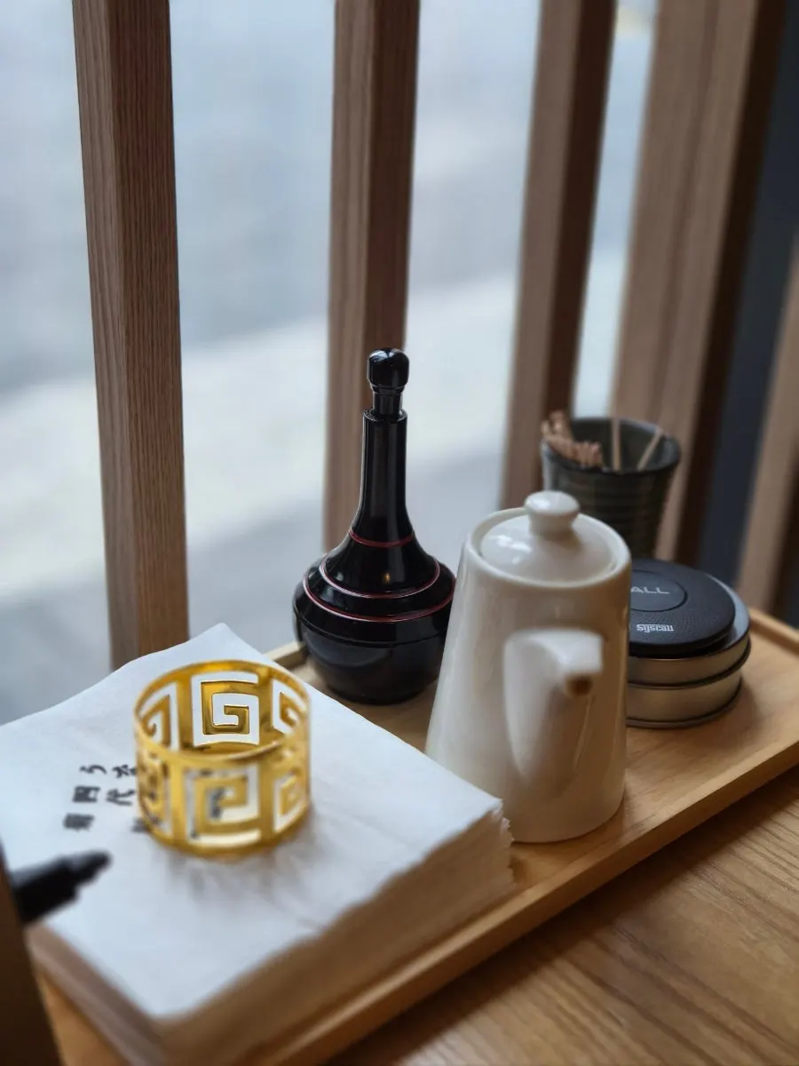 Sansho pepper and sauces set on the table
